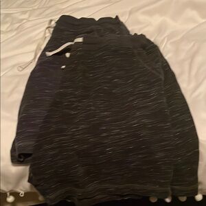 Black and navy lounge shorts with side pockets